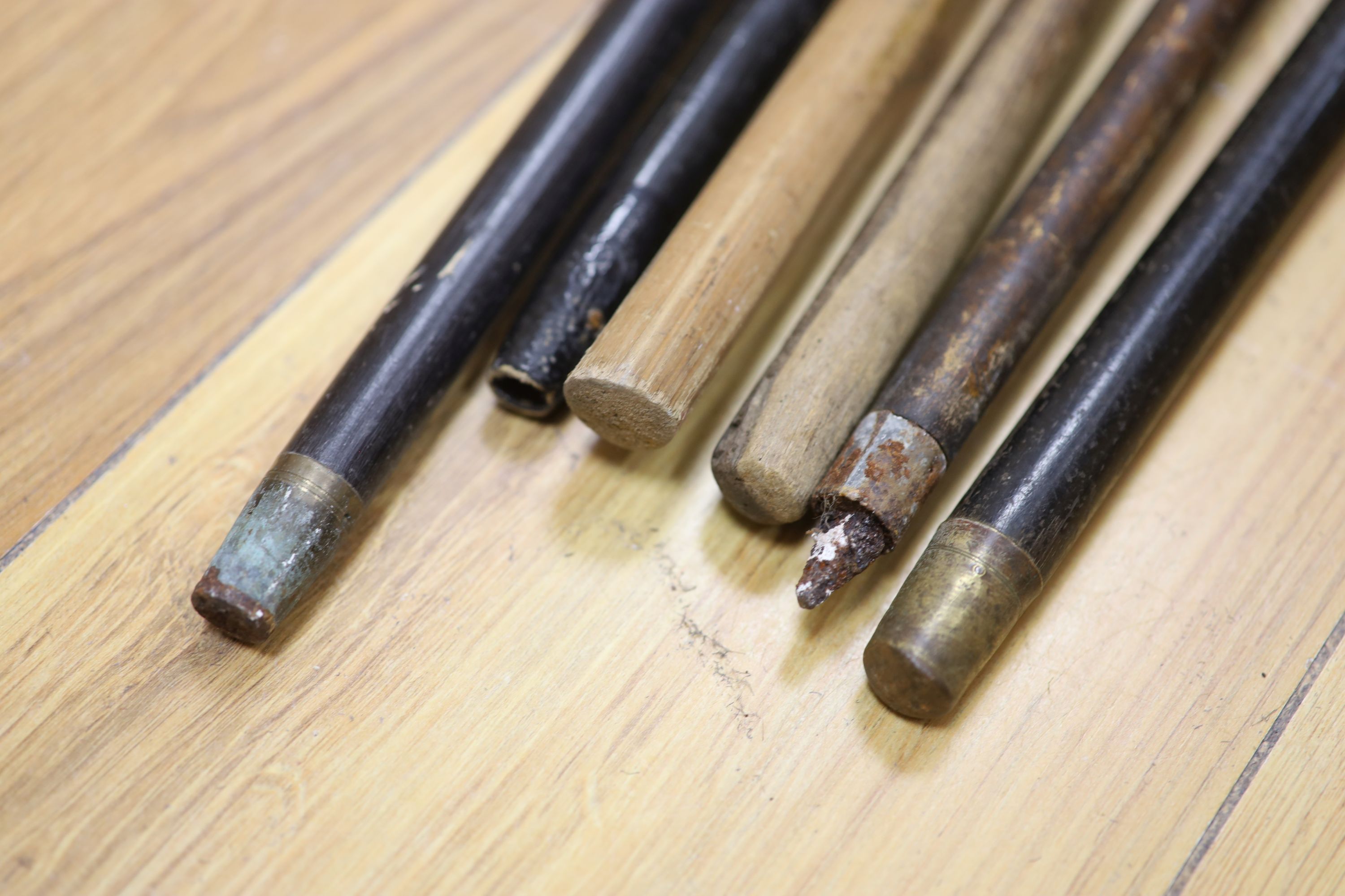 Three silver-mounted sticks and canes and three others